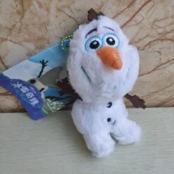 Peluche Pendentif Olaf 10 Peluche Pendentif Olaf -Ma Pleuche Soldes Peluche pendentif Olaf Peluche Olaf Peluche Disney Peluche Reine des Neiges Materiau Coton 2
